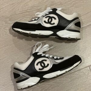CHANEL Women’s  Sneakers in Black, White, and Silver